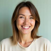 Portrait of Sarah L., 38, looking vibrant and healthy.