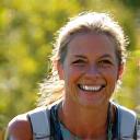 Smiling woman, Sarah M., enjoying outdoor activity